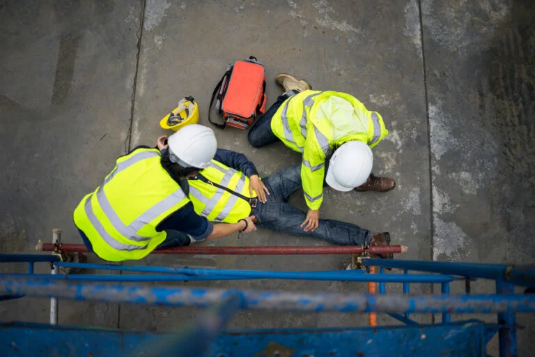 Builder injury accident falling scaffolding to the floor.